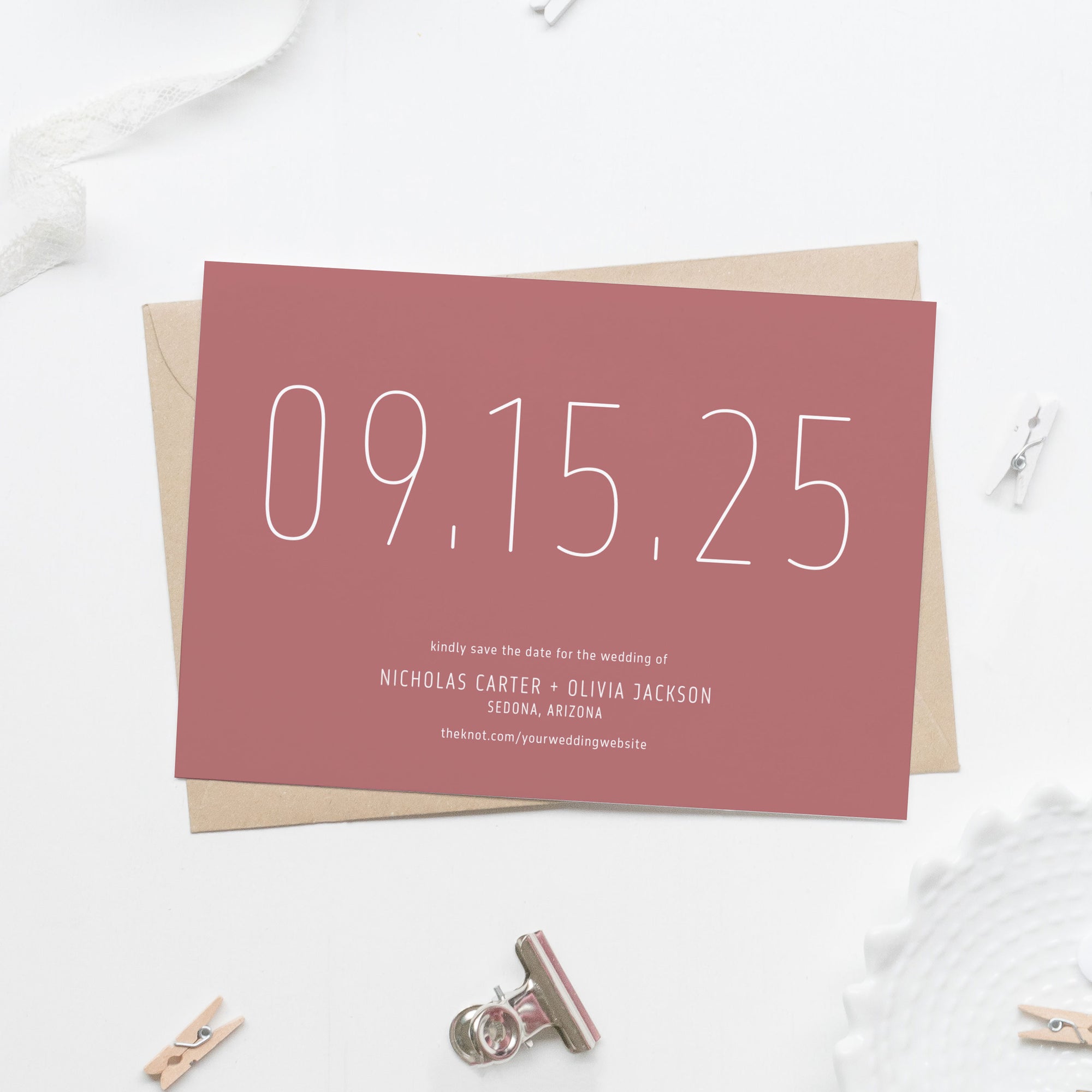 dusty rose pink save the date card in white sans serif skinny font with large date