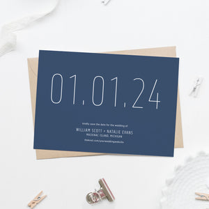 dark navy blue save the date card in white sans serif skinny font with large date